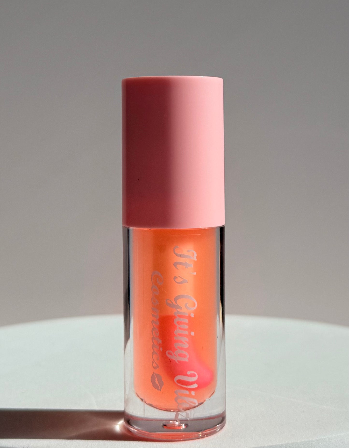 Orange Crush ( Color Changing lipgloss and lip tint) changes to pink